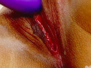 Japanese teen stretching her cherry with a XXX toy